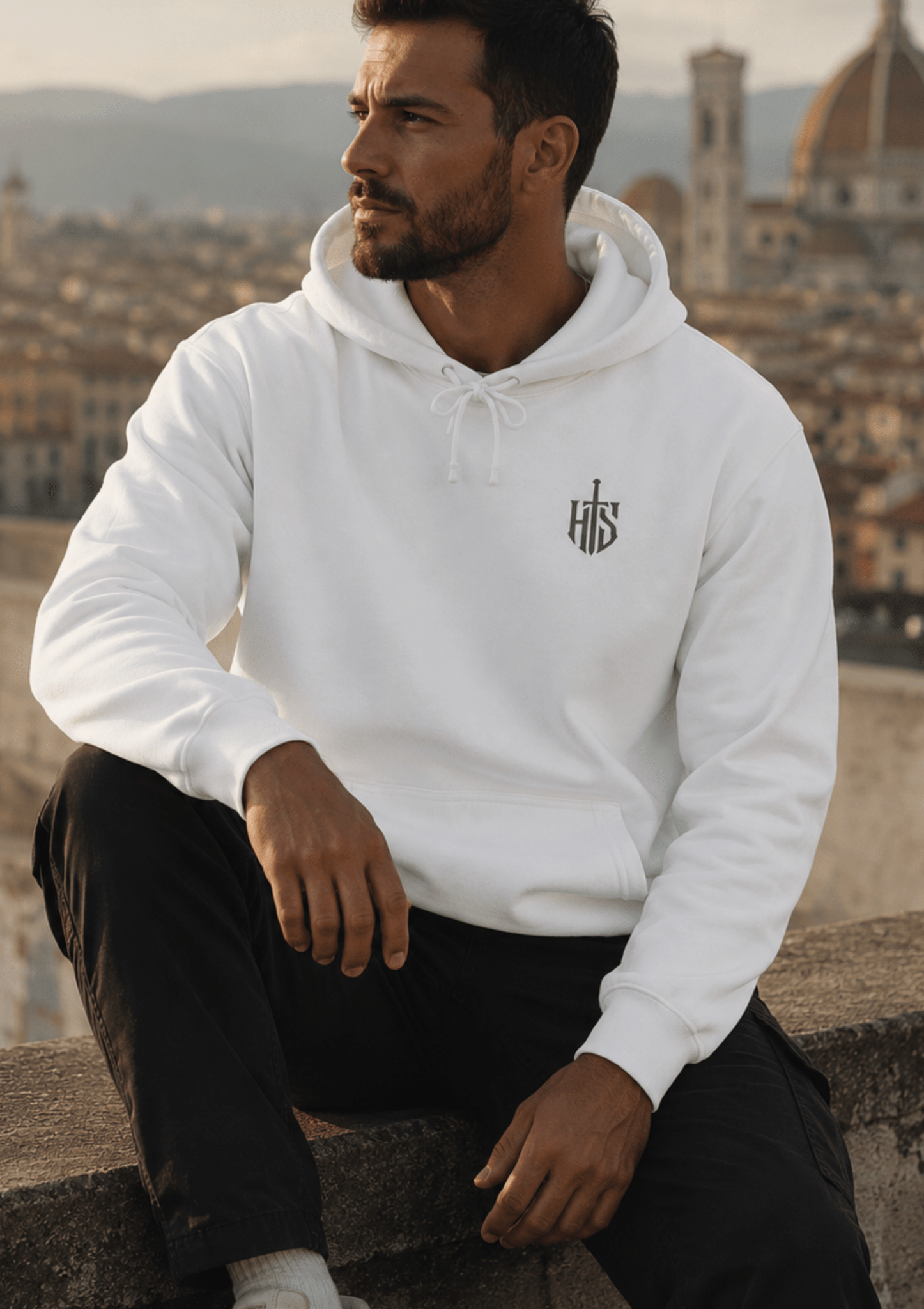 White Hilt and Stone core hoodie featuring minimal shield emblem